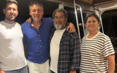 Vahe Kılıçarslan on the aft deck of Poseidon 07 at night with the Cengiz family